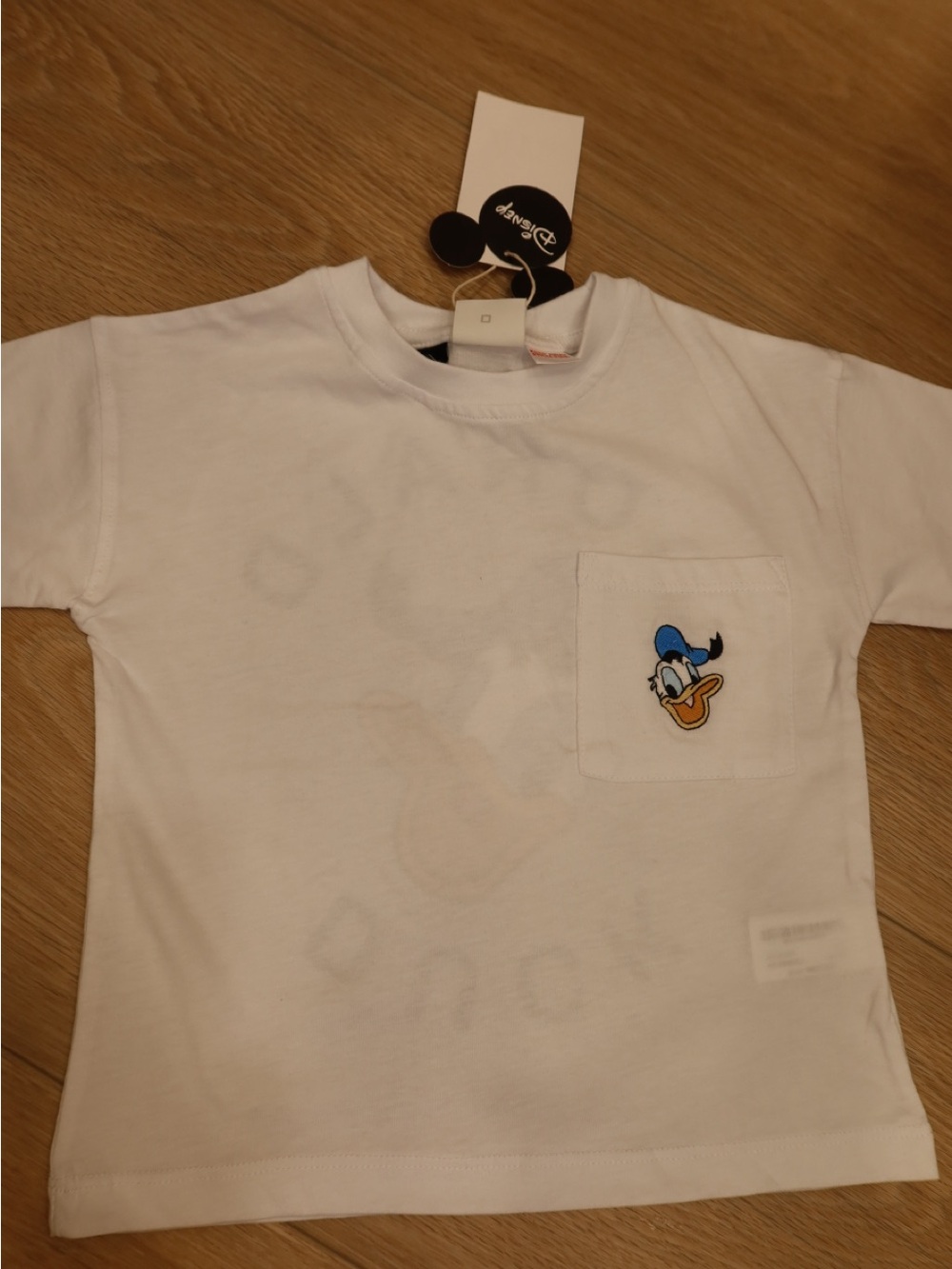 Disney White Short Sleeve Tee with Donald Duck Pocket Patch